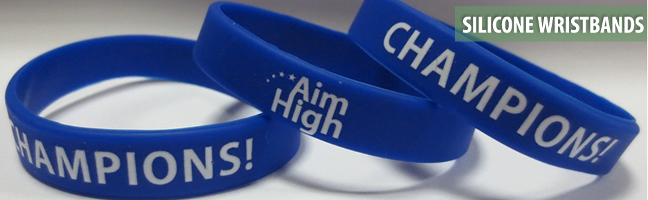 Custom blue silicone wristbands printed with Champions and Aim High messages